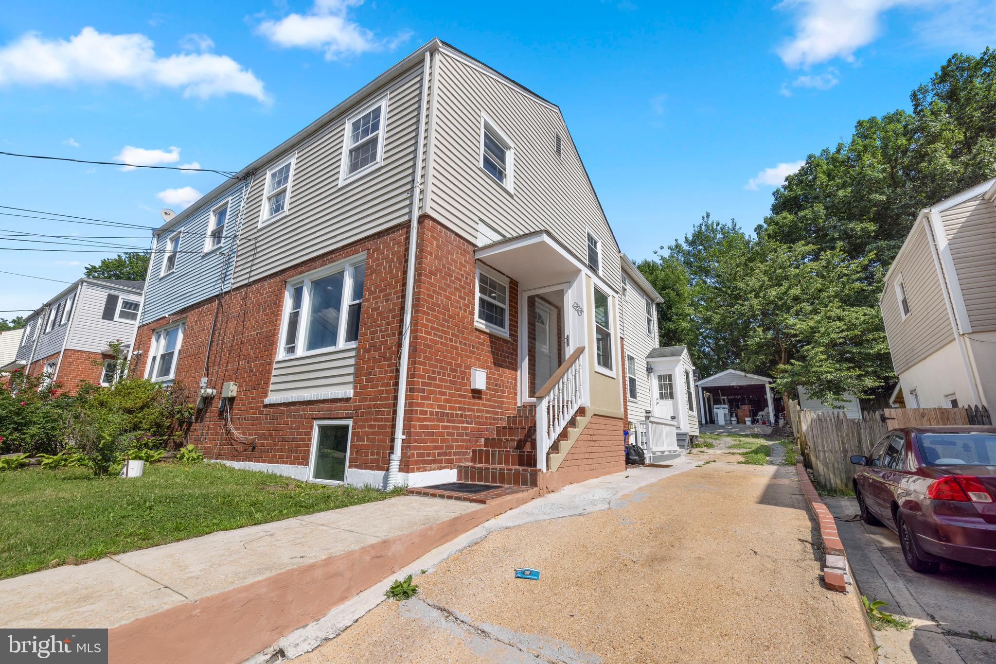 12025 Claridge Road Silver Spring, MD 20902 - Photo 3 of 25 a front view of a house with a yard