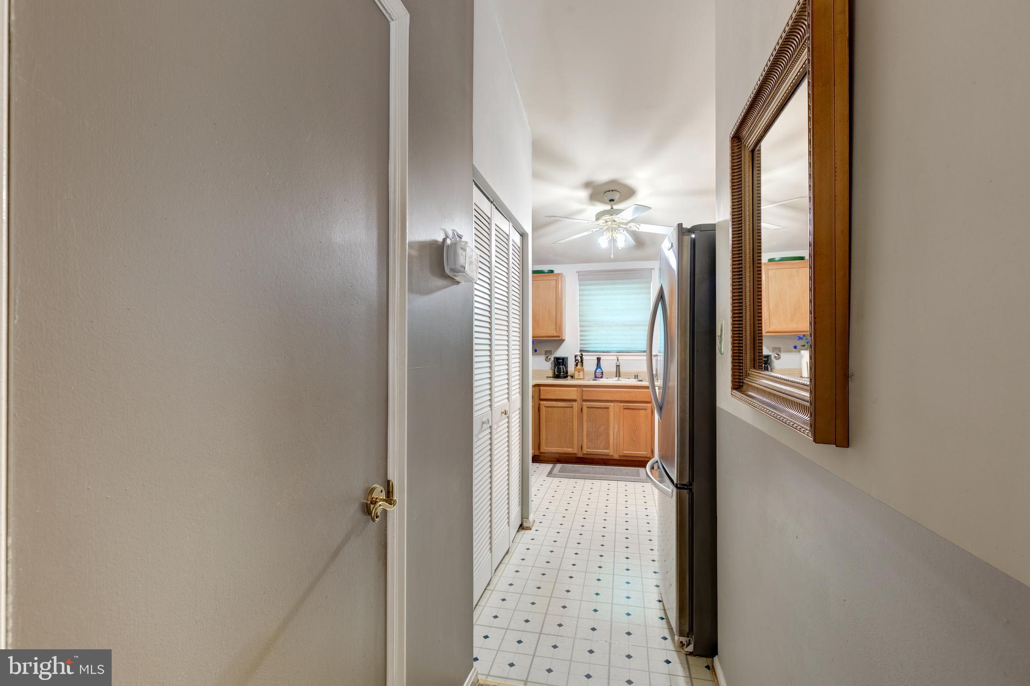 502 Brighton Place Baltimore, MD 21221 - Photo 16 of 42 a bathroom with a glass door shower and a sink