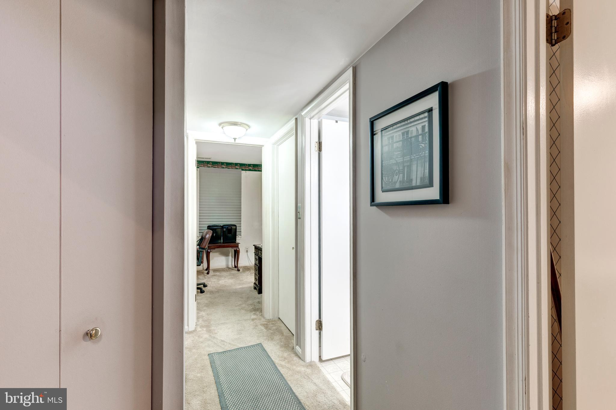 502 Brighton Place Baltimore, MD 21221 - Photo 21 of 42 a view of a hallway with interior of the house