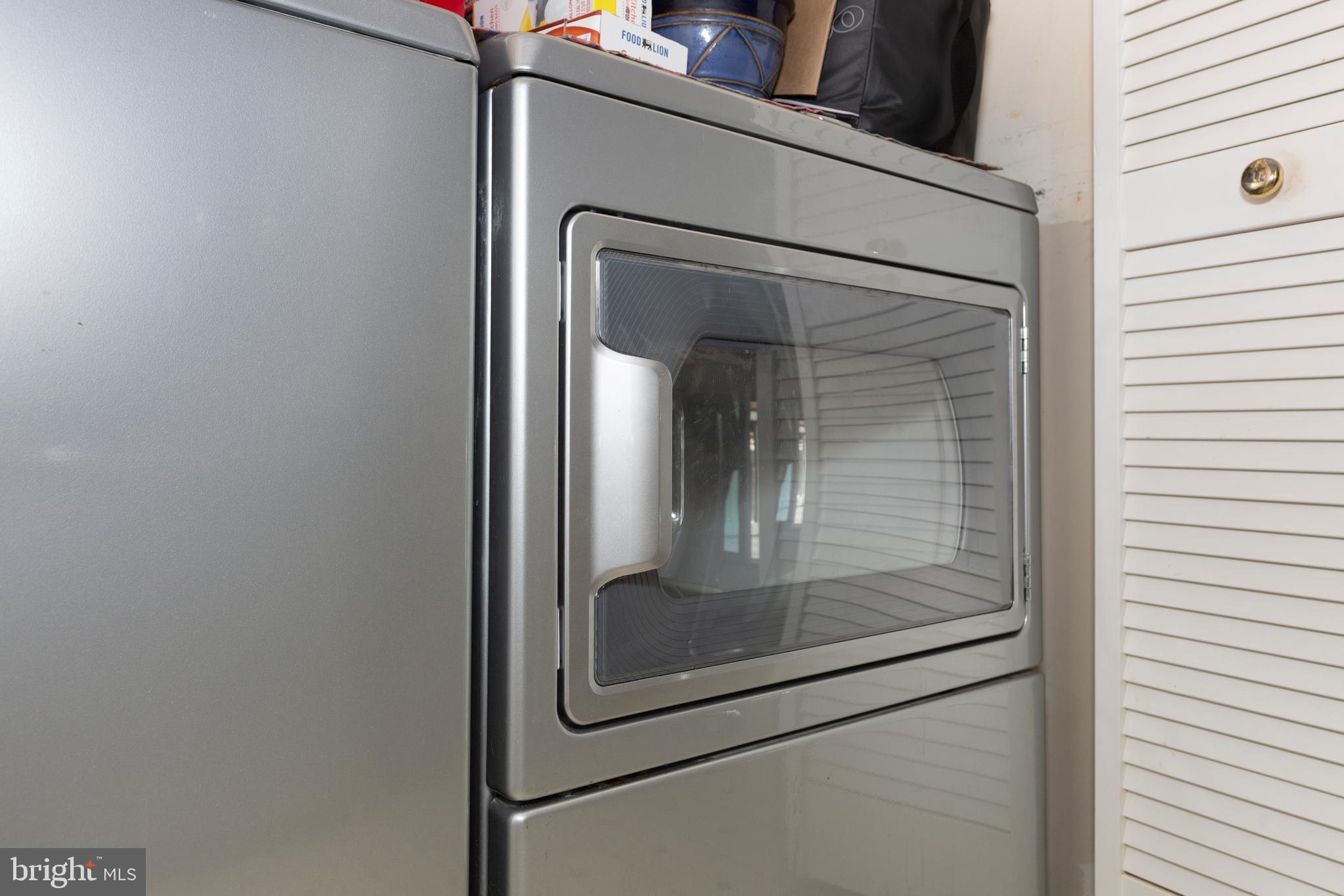 502 Brighton Place Baltimore, MD 21221 - Photo 30 of 42 a glass door with a glass door