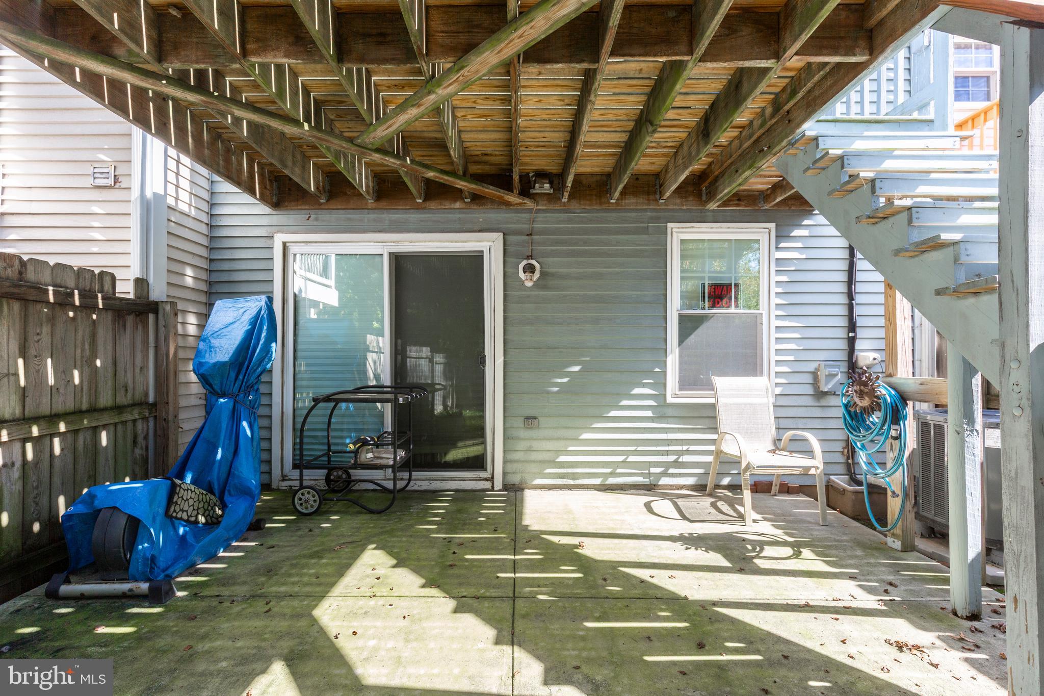502 Brighton Place Baltimore, MD 21221 - Photo 36 of 42 a view of a porch with wooden floor