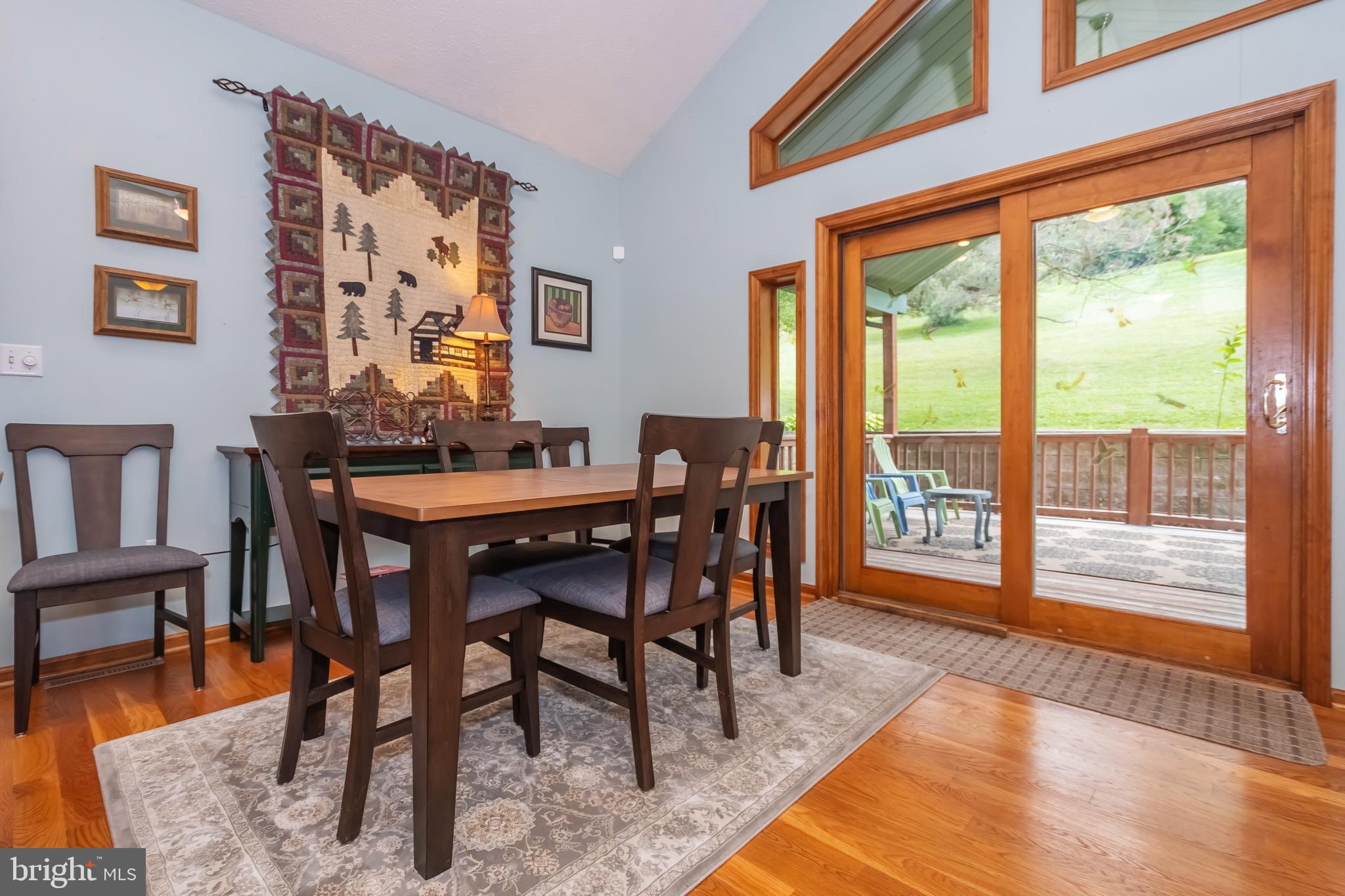 592 Marsh Hill Road McHenry, MD 21541 - Photo 13 of 51 a dining room with furniture and wooden floor