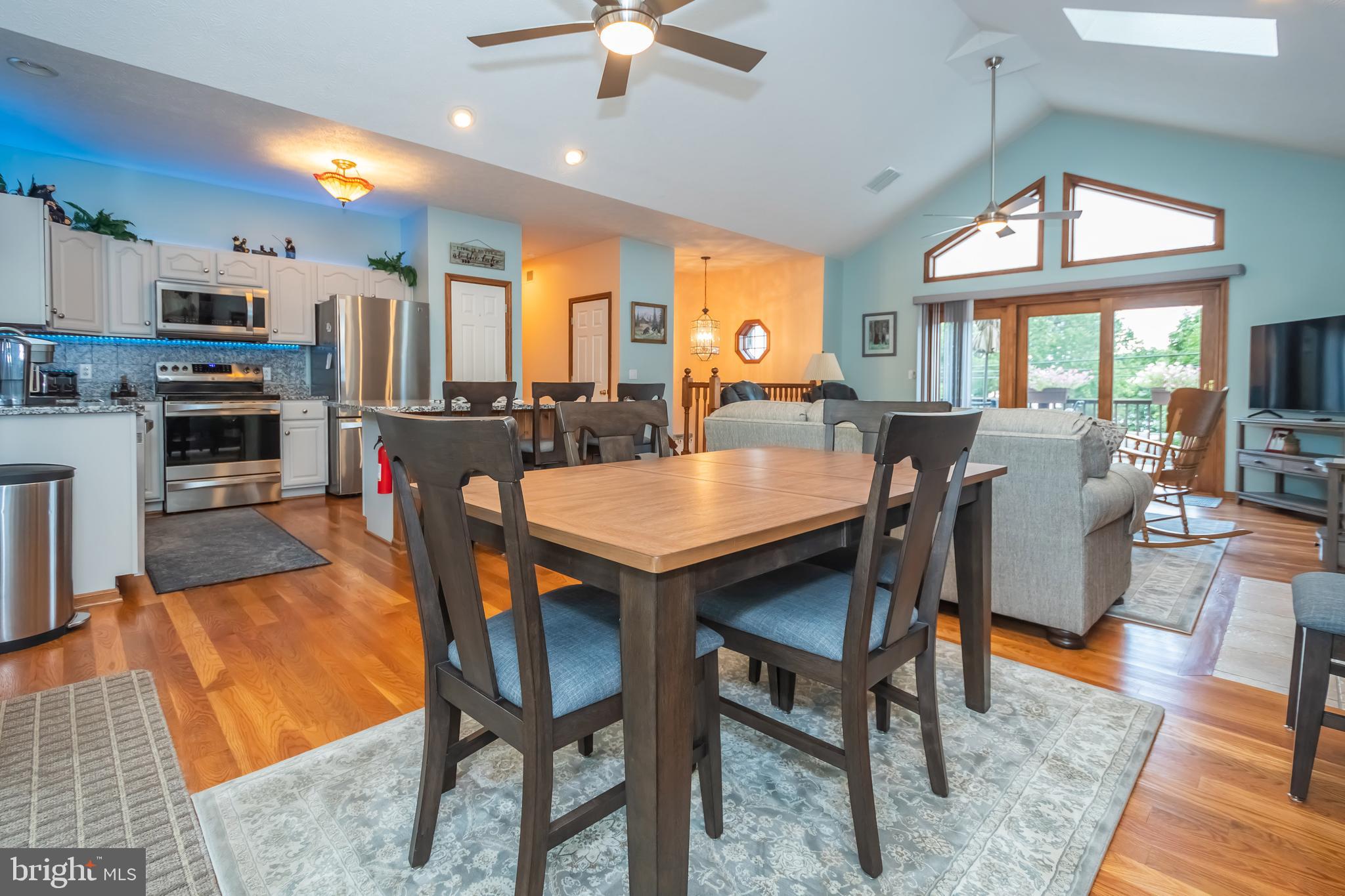 592 Marsh Hill Road McHenry, MD 21541 - Photo 14 of 51 a view of a dining room with furniture window and wooden floor