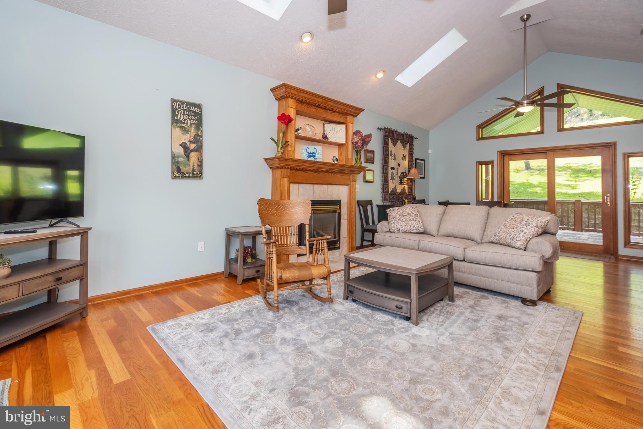 592 Marsh Hill Road McHenry, MD 21541 - Photo 16 of 51 a living room with furniture and a flat screen tv