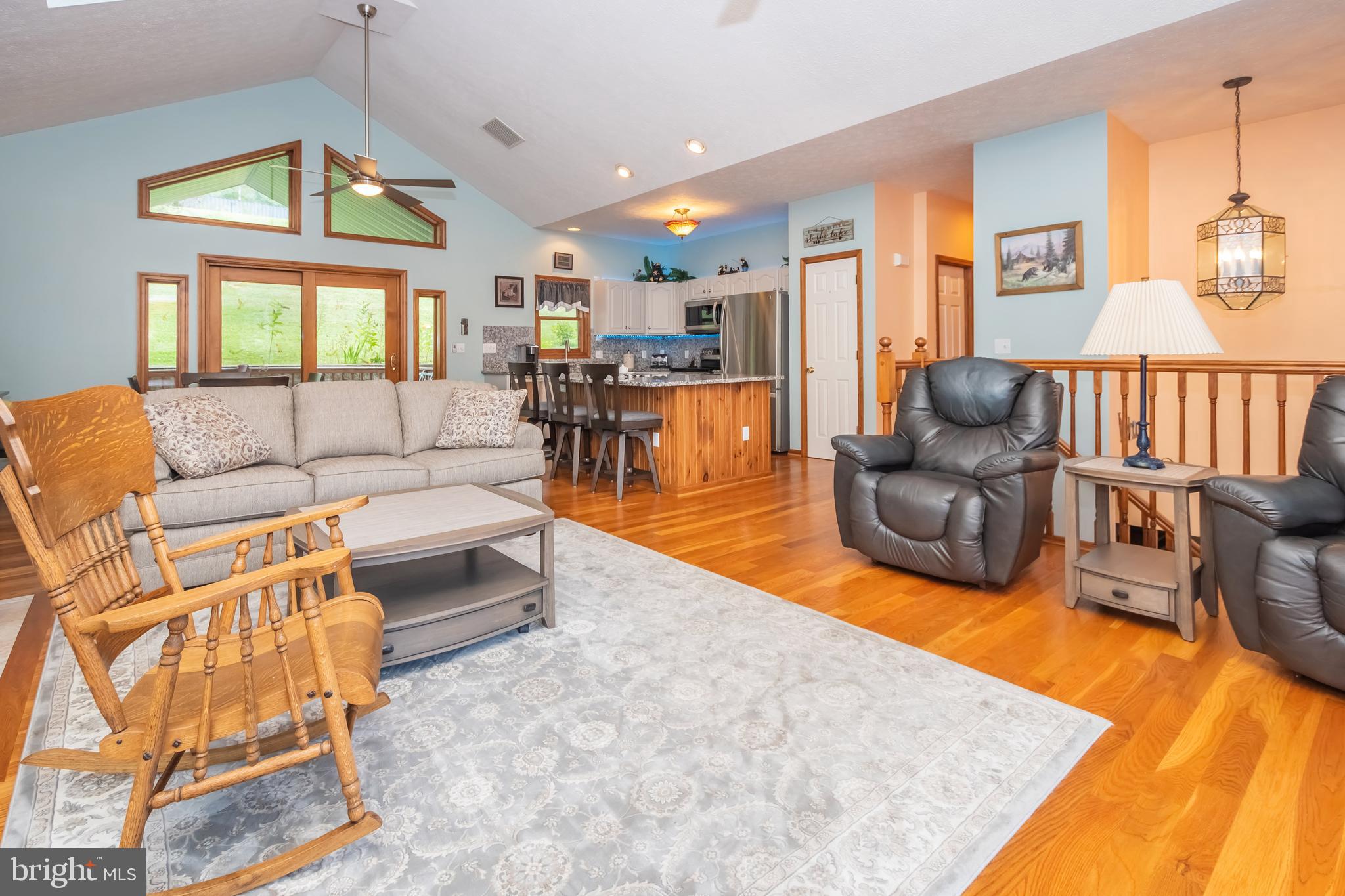 592 Marsh Hill Road McHenry, MD 21541 - Photo 17 of 51 a living room with fireplace furniture and a large window
