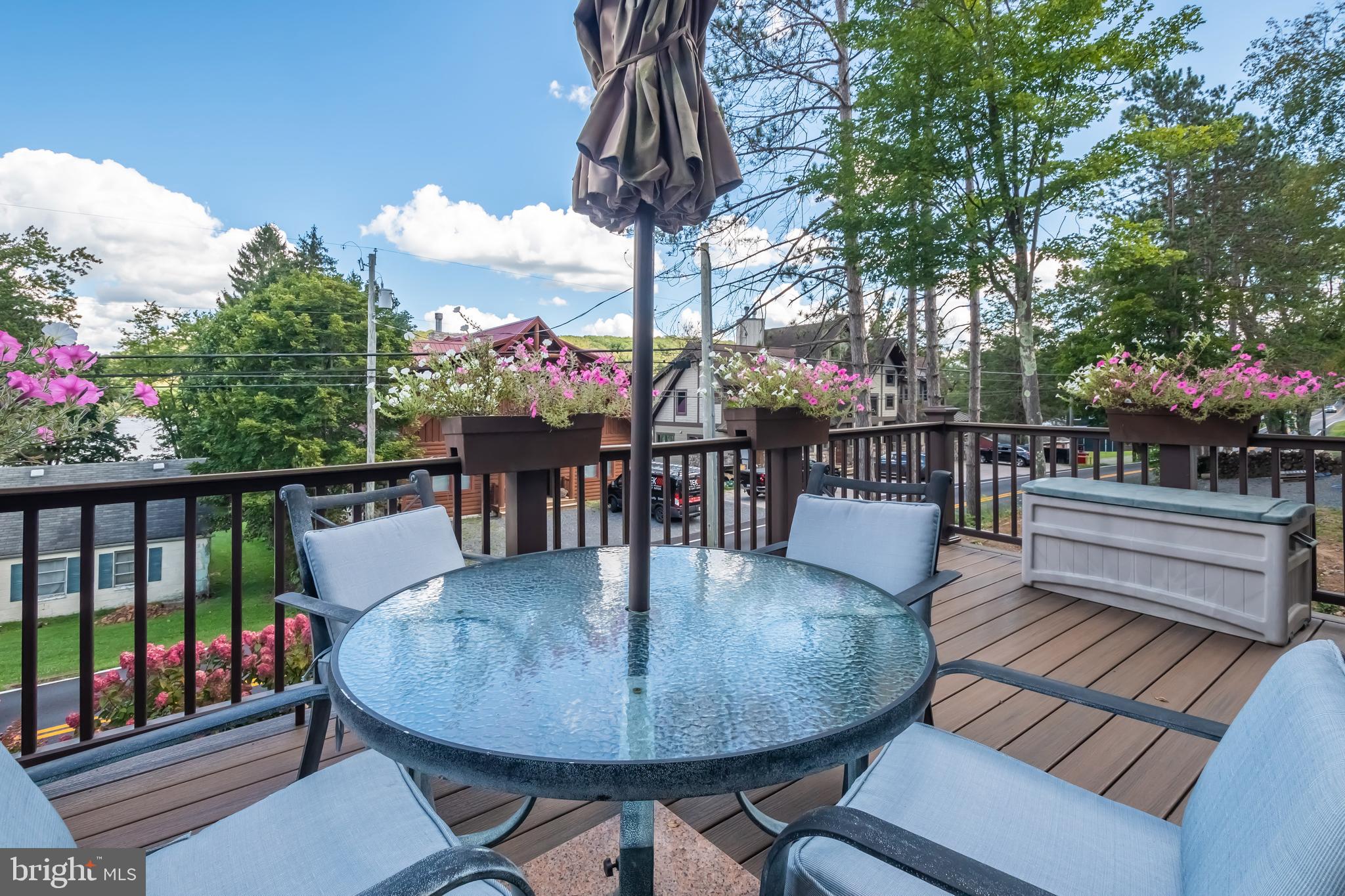 592 Marsh Hill Road McHenry, MD 21541 - Photo 2 of 51 a view of a chairs and table in the balcony