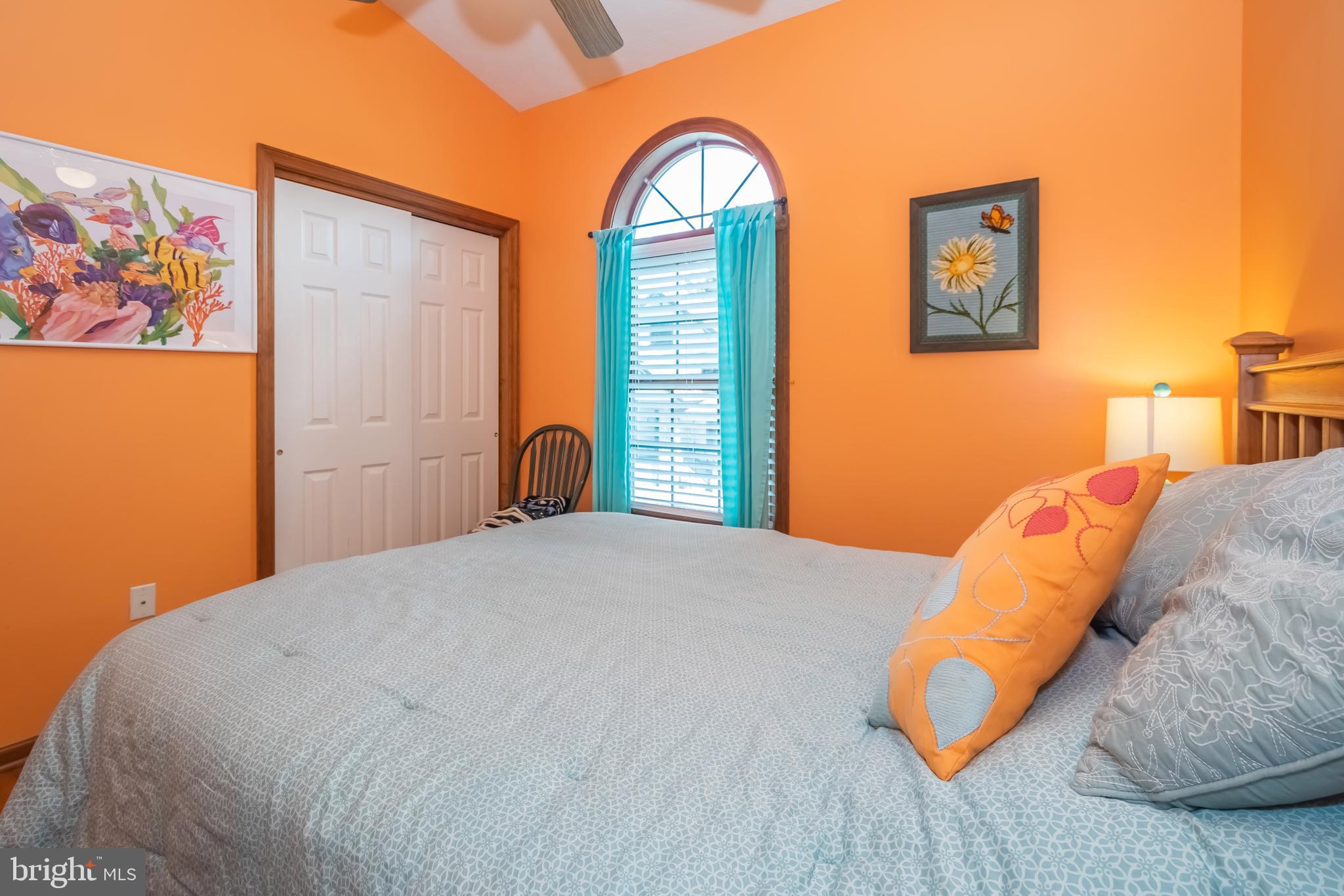 592 Marsh Hill Road McHenry, MD 21541 - Photo 21 of 51 a bedroom with a bed and a painting on the wall