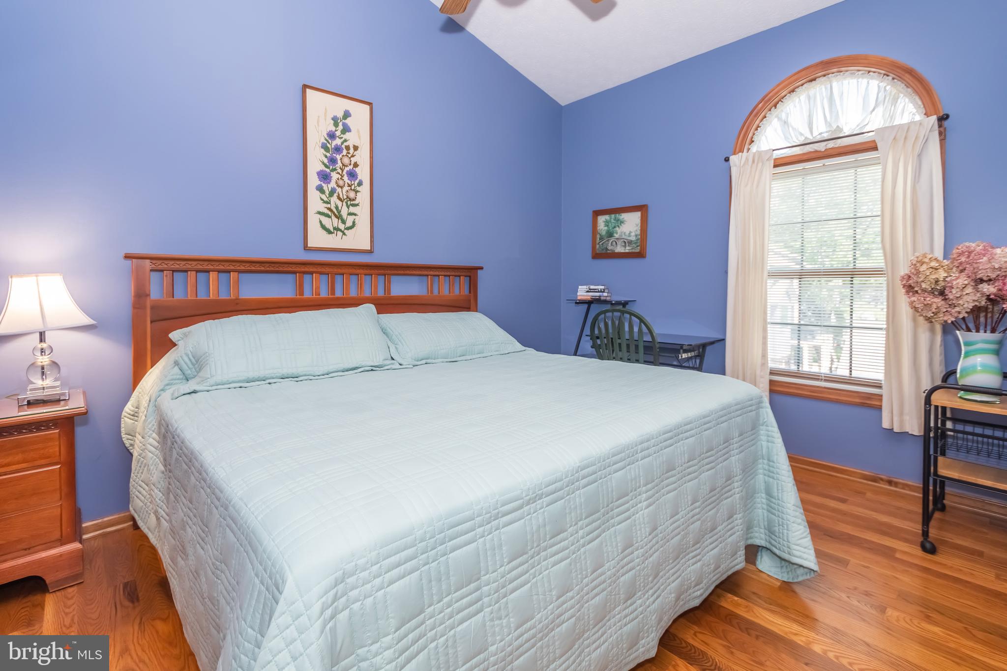 592 Marsh Hill Road McHenry, MD 21541 - Photo 22 of 51 a bedroom with a bed and a large window