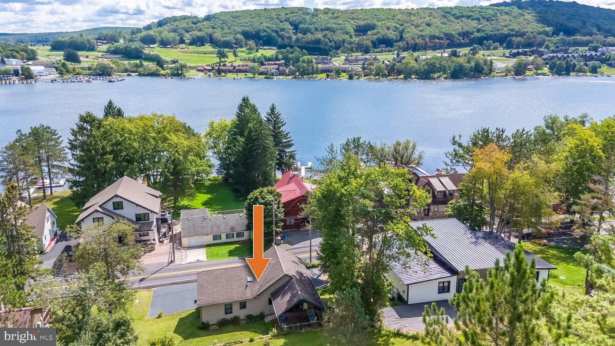 592 Marsh Hill Road McHenry, MD 21541 - Photo 3 of 51 an aerial view of a house with outdoor space and lake view