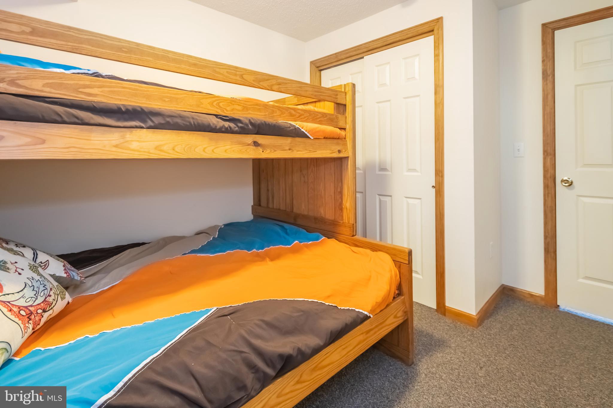 592 Marsh Hill Road McHenry, MD 21541 - Photo 31 of 51 a bedroom with a bed and a window