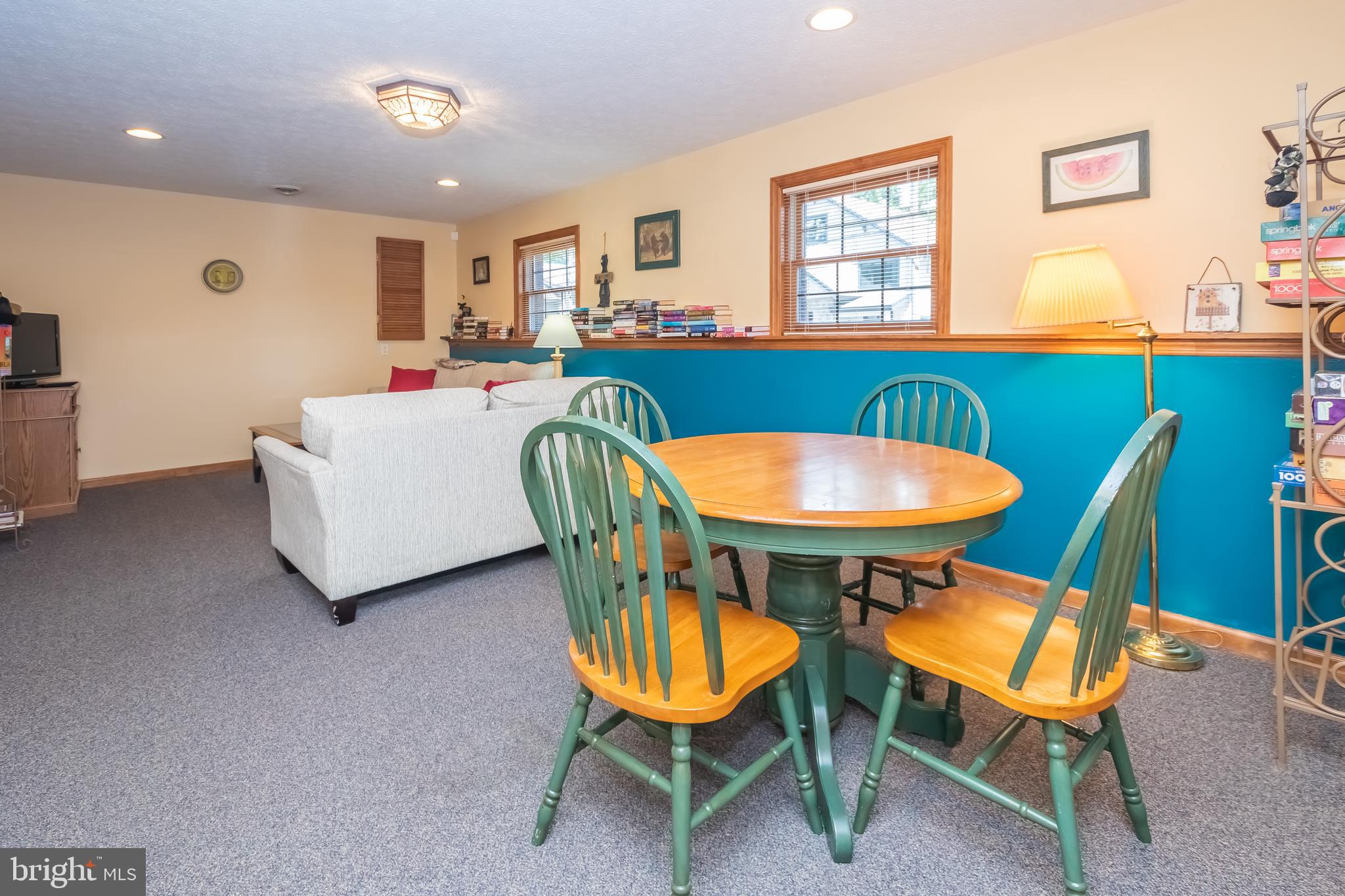 592 Marsh Hill Road McHenry, MD 21541 - Photo 34 of 51 a living room with furniture and a dining table