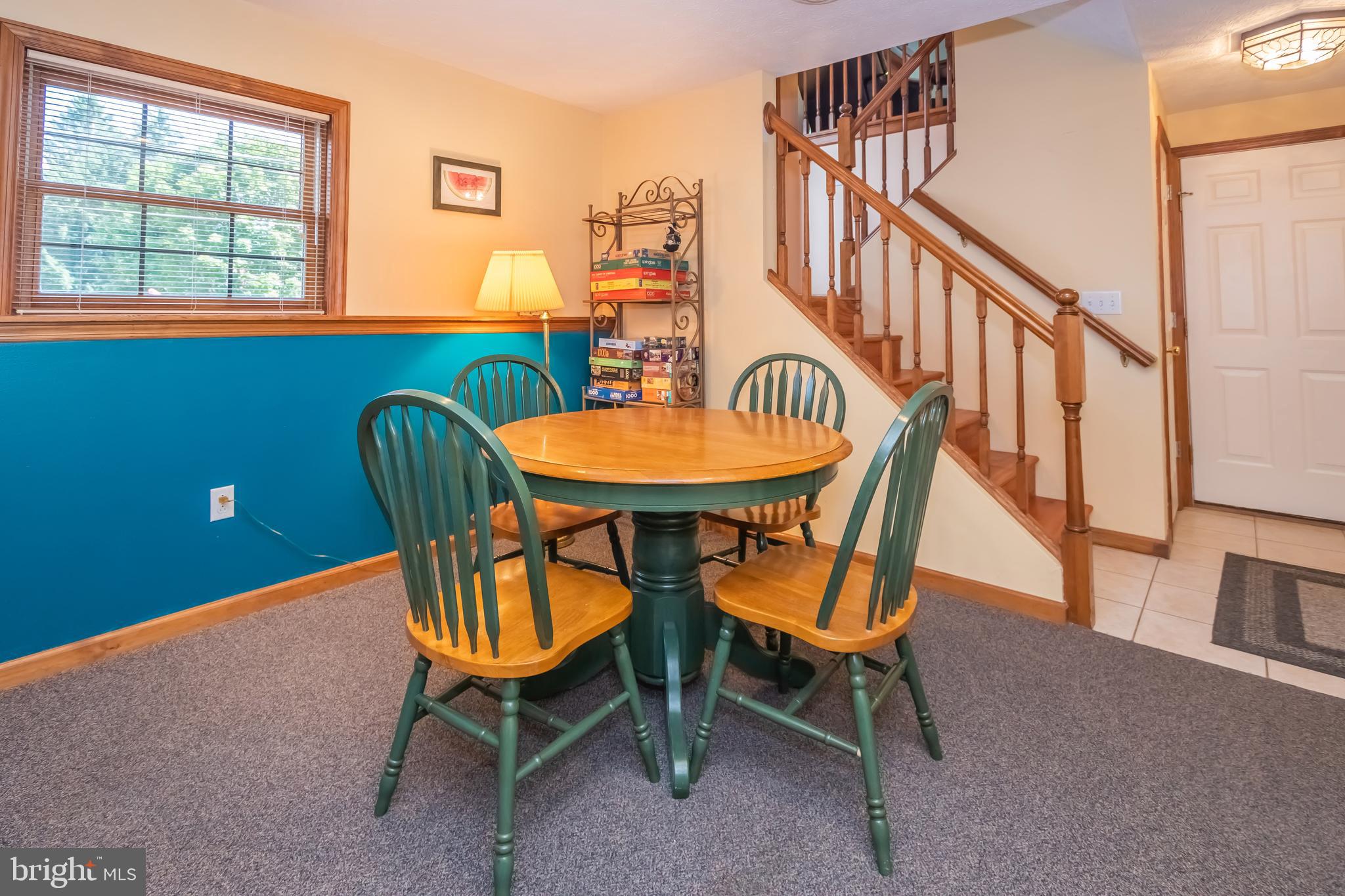 592 Marsh Hill Road McHenry, MD 21541 - Photo 36 of 51 a dining room with furniture and a window