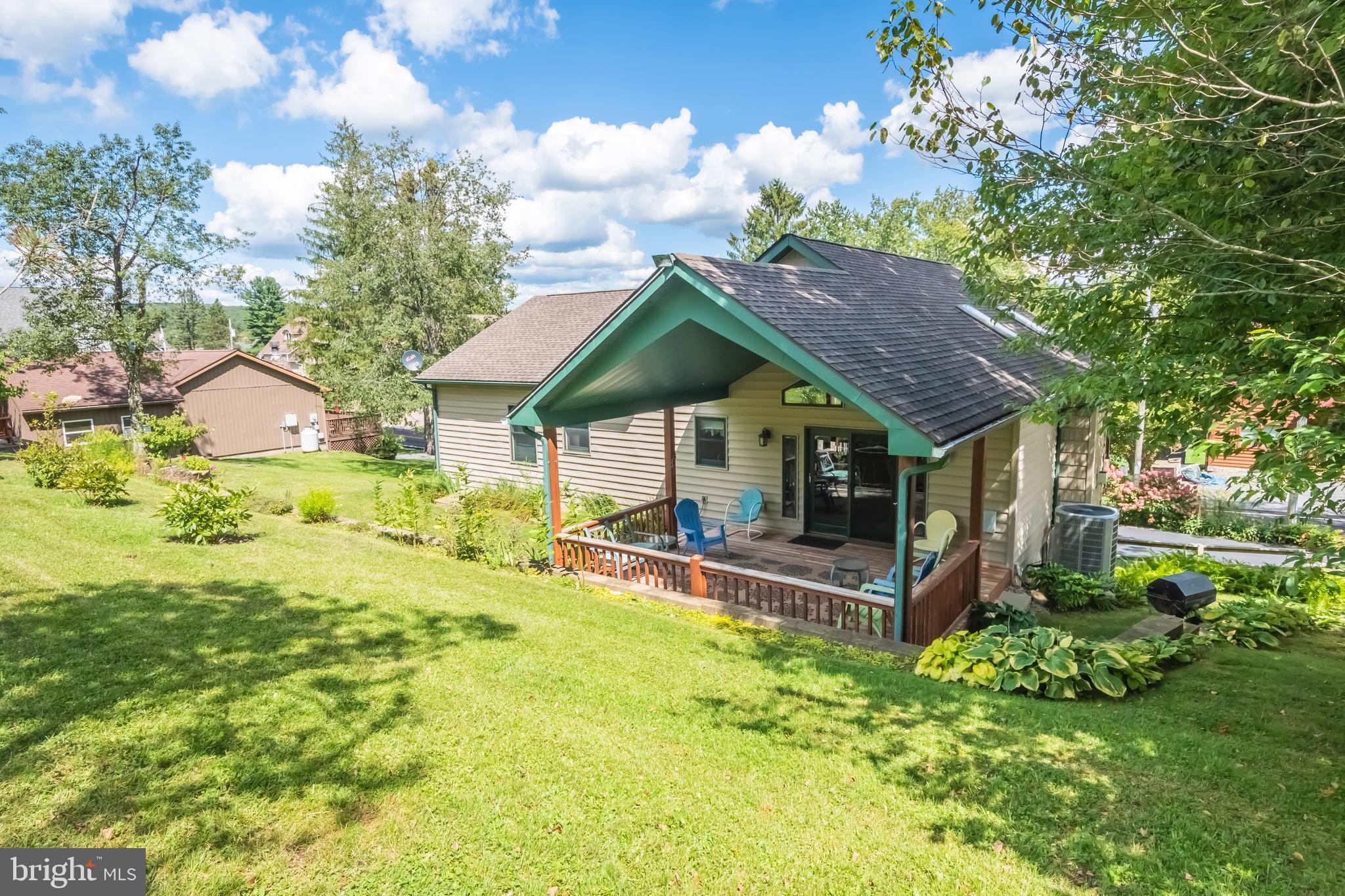 592 Marsh Hill Road McHenry, MD 21541 - Photo 41 of 51 a front view of house with garden