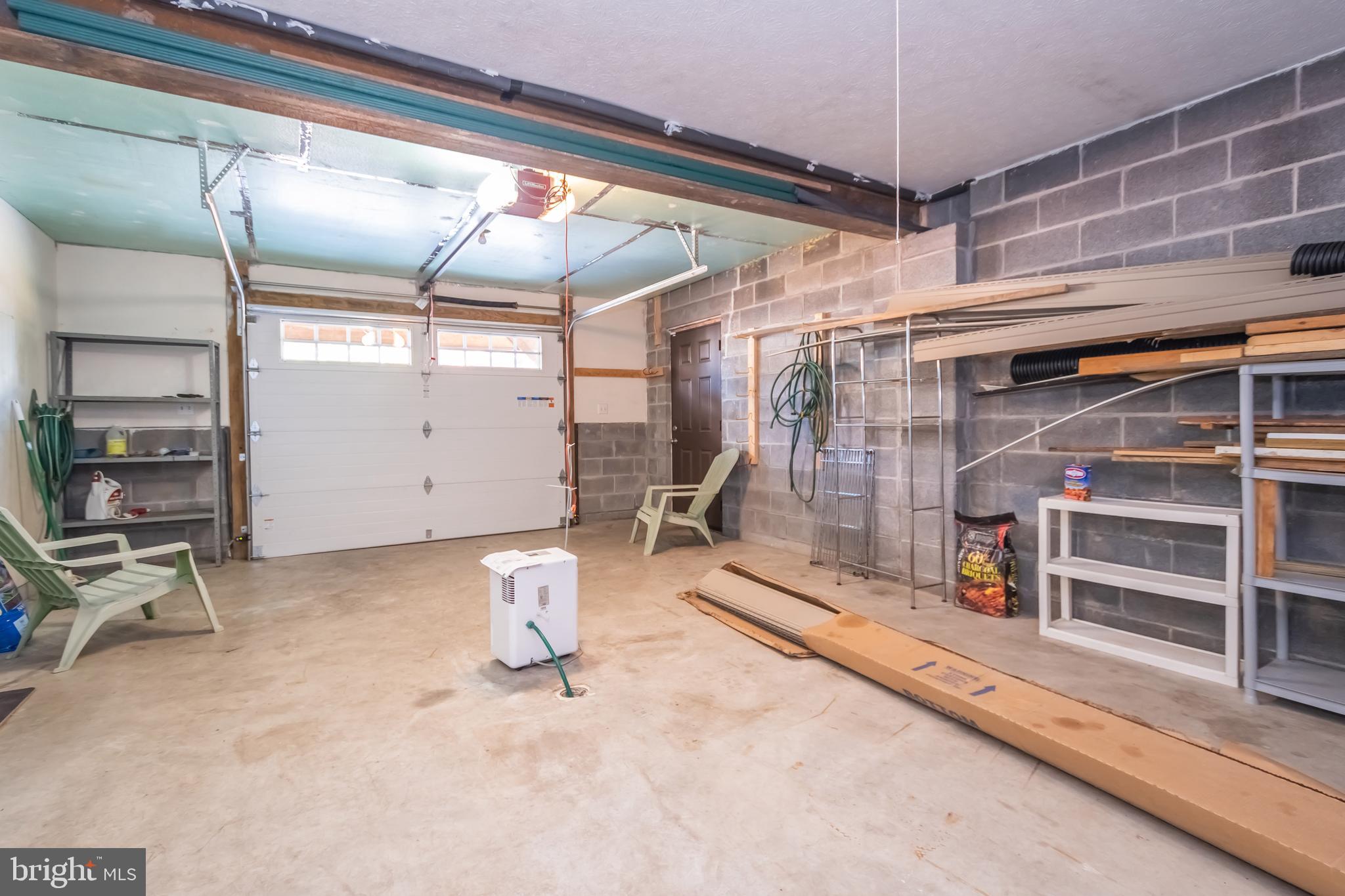 592 Marsh Hill Road McHenry, MD 21541 - Photo 51 of 51 a view of empty room with wooden floor and windows