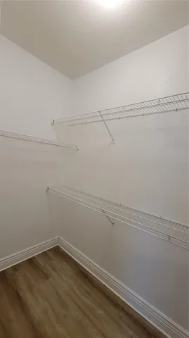 a view of a room with racks on the wall