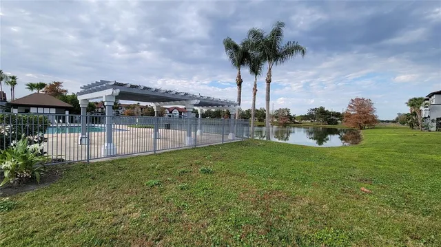 a view of a chairs and tables in the patio