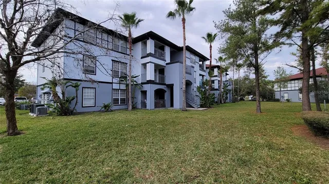 a view of a house with a street
