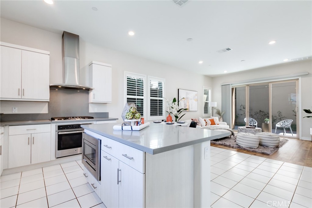 800 Beacon Irvine, CA 92618 - Photo 14 of 49 a kitchen with a sink and stove