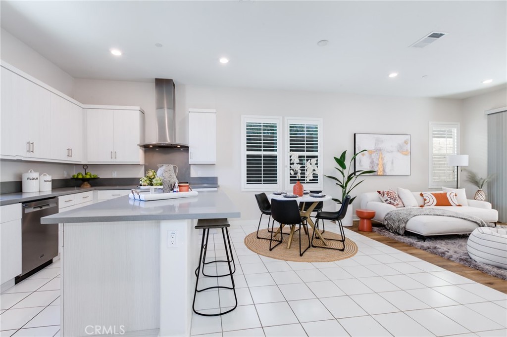 800 Beacon Irvine, CA 92618 - Photo 16 of 49 a kitchen with stainless steel appliances kitchen island granite countertop a sink and cabinets