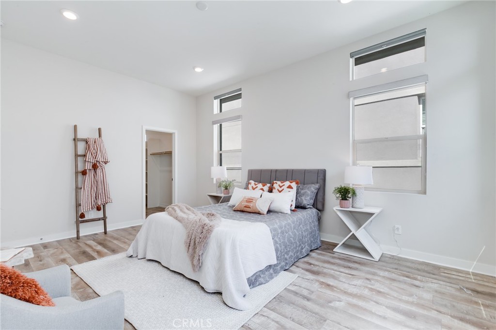 800 Beacon Irvine, CA 92618 - Photo 23 of 49 a bedroom with a bed and a window