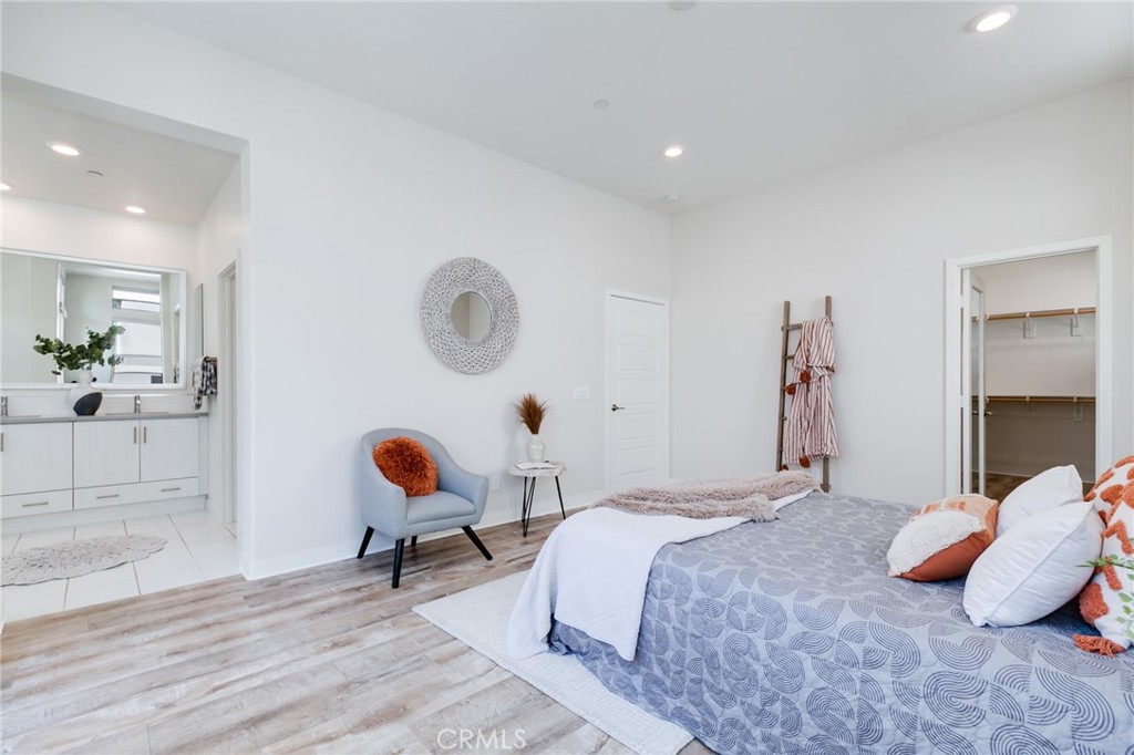 800 Beacon Irvine, CA 92618 - Photo 24 of 49 a bedroom with a bed and window