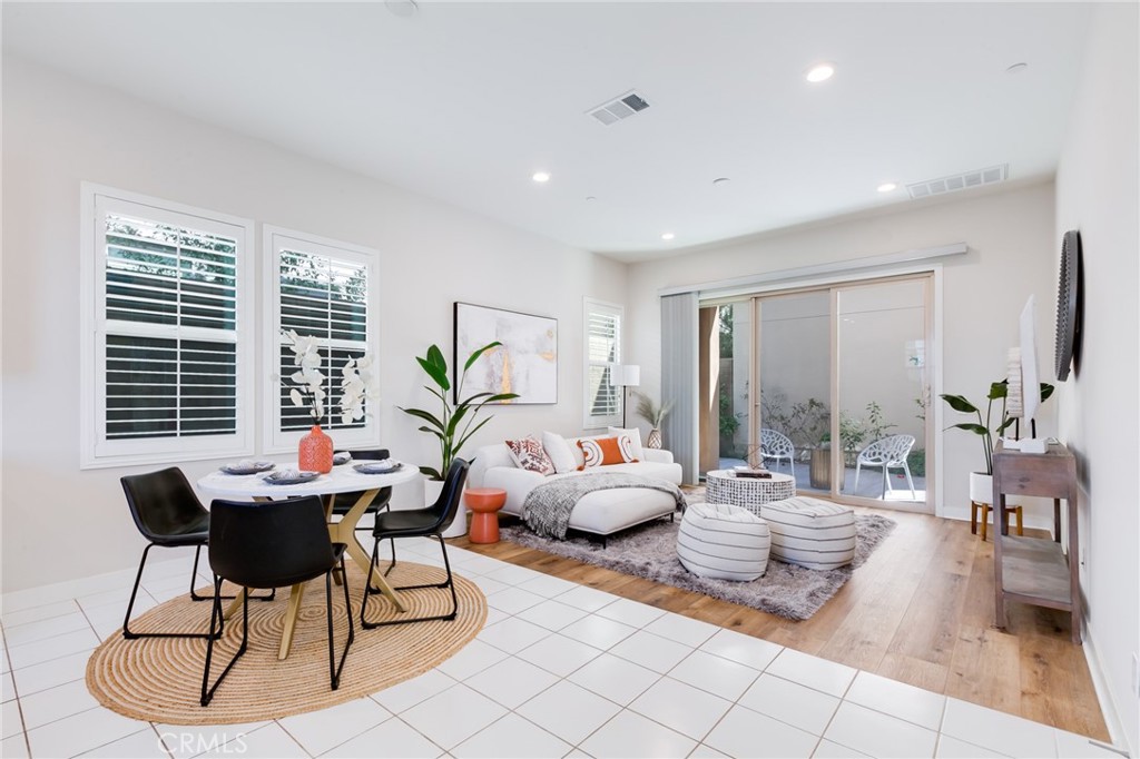 800 Beacon Irvine, CA 92618 - Photo 6 of 49 a living room with furniture and a potted plant