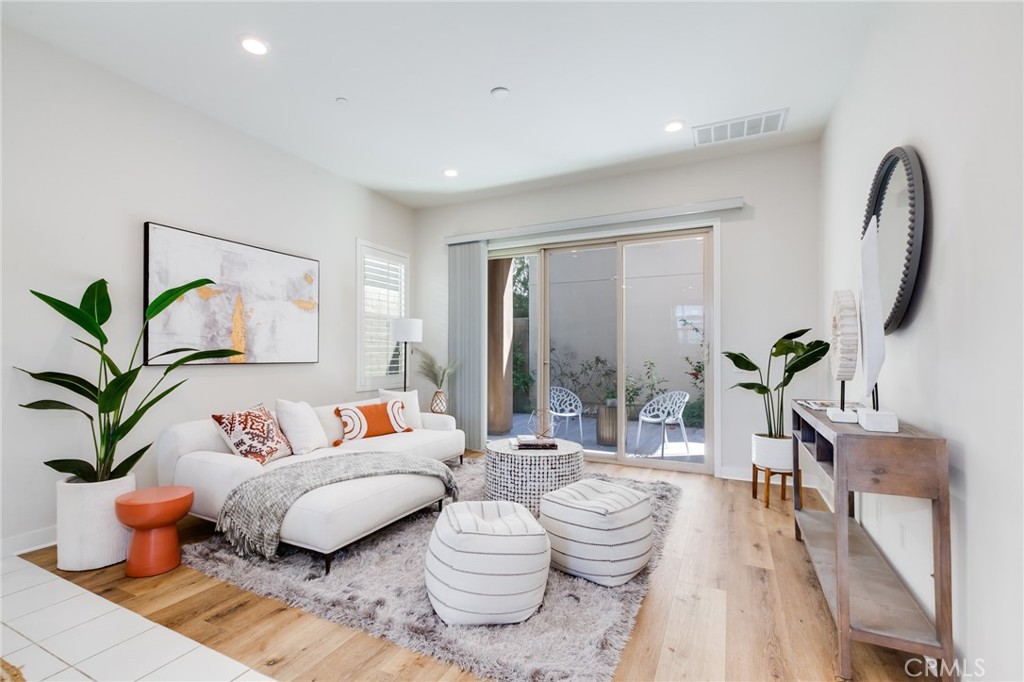 800 Beacon Irvine, CA 92618 - Photo 7 of 49 a living room with furniture a potted plant and a rug