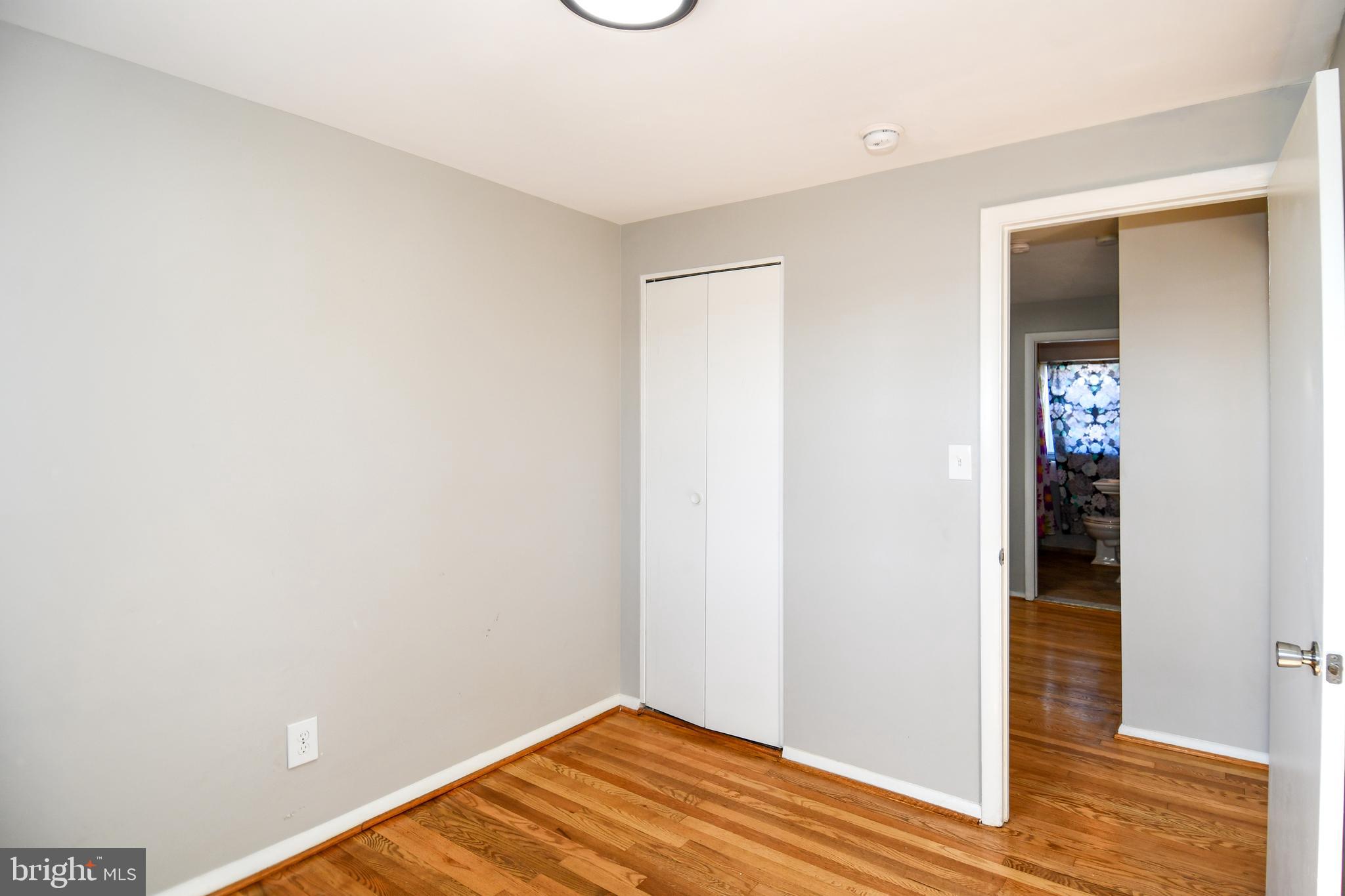 4223 Labyrinth Road Baltimore, MD 21215 - Photo 16 of 22 a view of small space with wooden floor