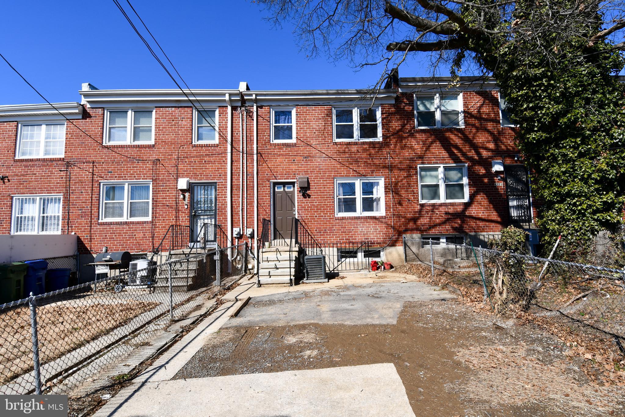4223 Labyrinth Road Baltimore, MD 21215 - Photo 21 of 22 a view of a building with many windows
