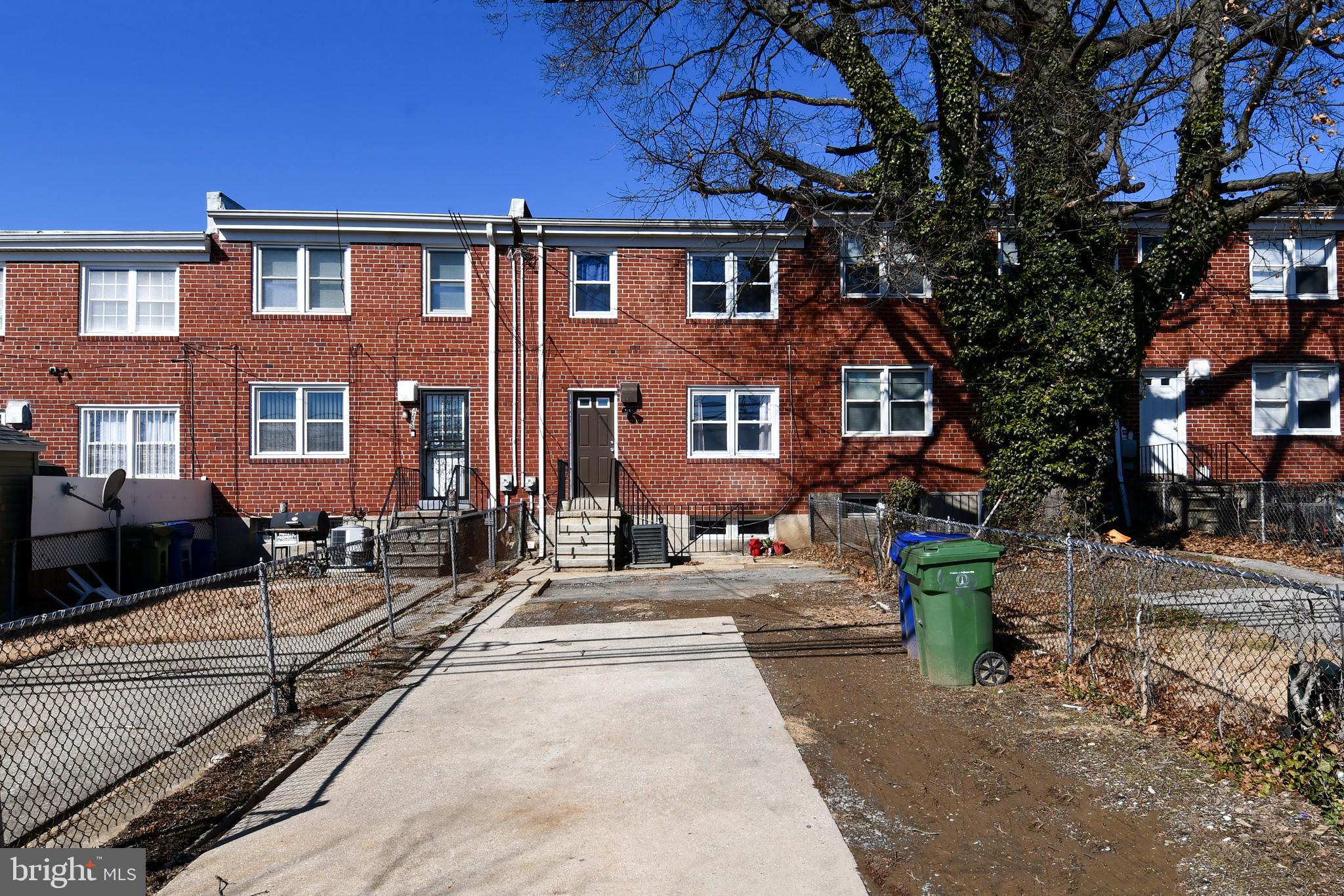 4223 Labyrinth Road Baltimore, MD 21215 - Photo 22 of 22 a front view of a house with outdoor space