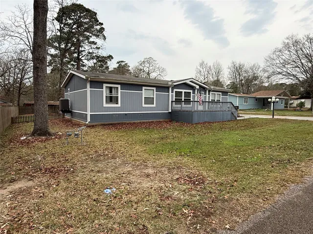 front view of a house with yard