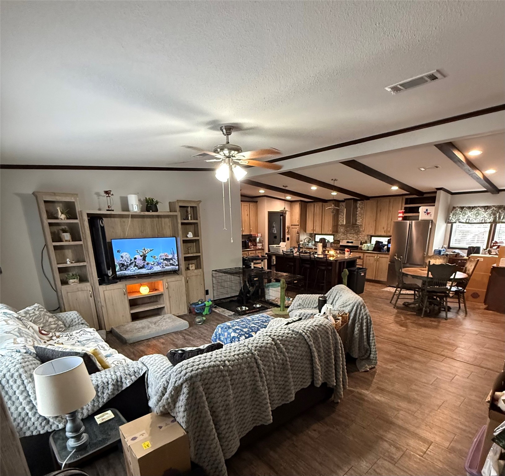 178 Commanche Drive Onalaska, TX 77360 - Photo 10 of 18 a living room with furniture and a flat screen tv
