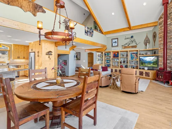 a kitchen with a refrigerator and a sink