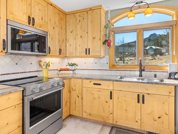 a view of a chairs and table on the terrace