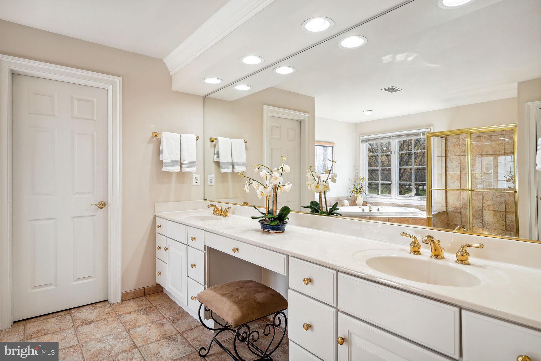 11308 Ridge Mist Terrace Potomac, MD 20854 - Photo 18 of 31 Owners Bath with Double Vanity Sink