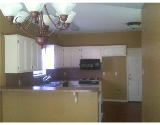 2822 Toronto Drive Corpus Christi, TX 78414 - Photo 3 of 6 a kitchen with a counter space cabinets and appliances