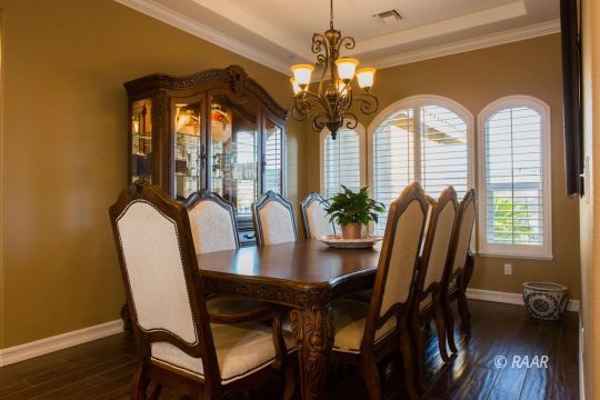 430 West Javis Avenue Ridgecrest, CA 93555 - Photo 9 of 35 a view of a dining room with furniture window and wooden floor