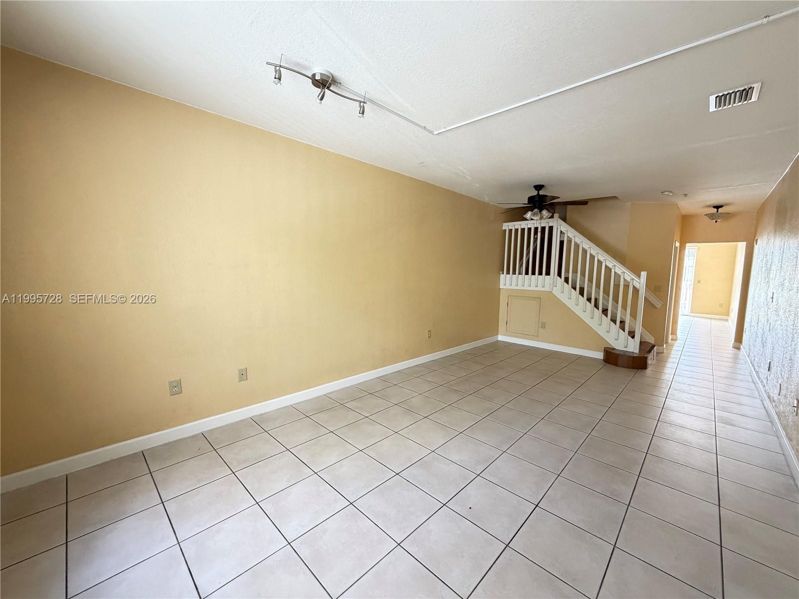 7080 Northwest 177th Street, Unit 20913 Hialeah, FL 33015 - Photo 6 of 15 a view of an entryway with stairs