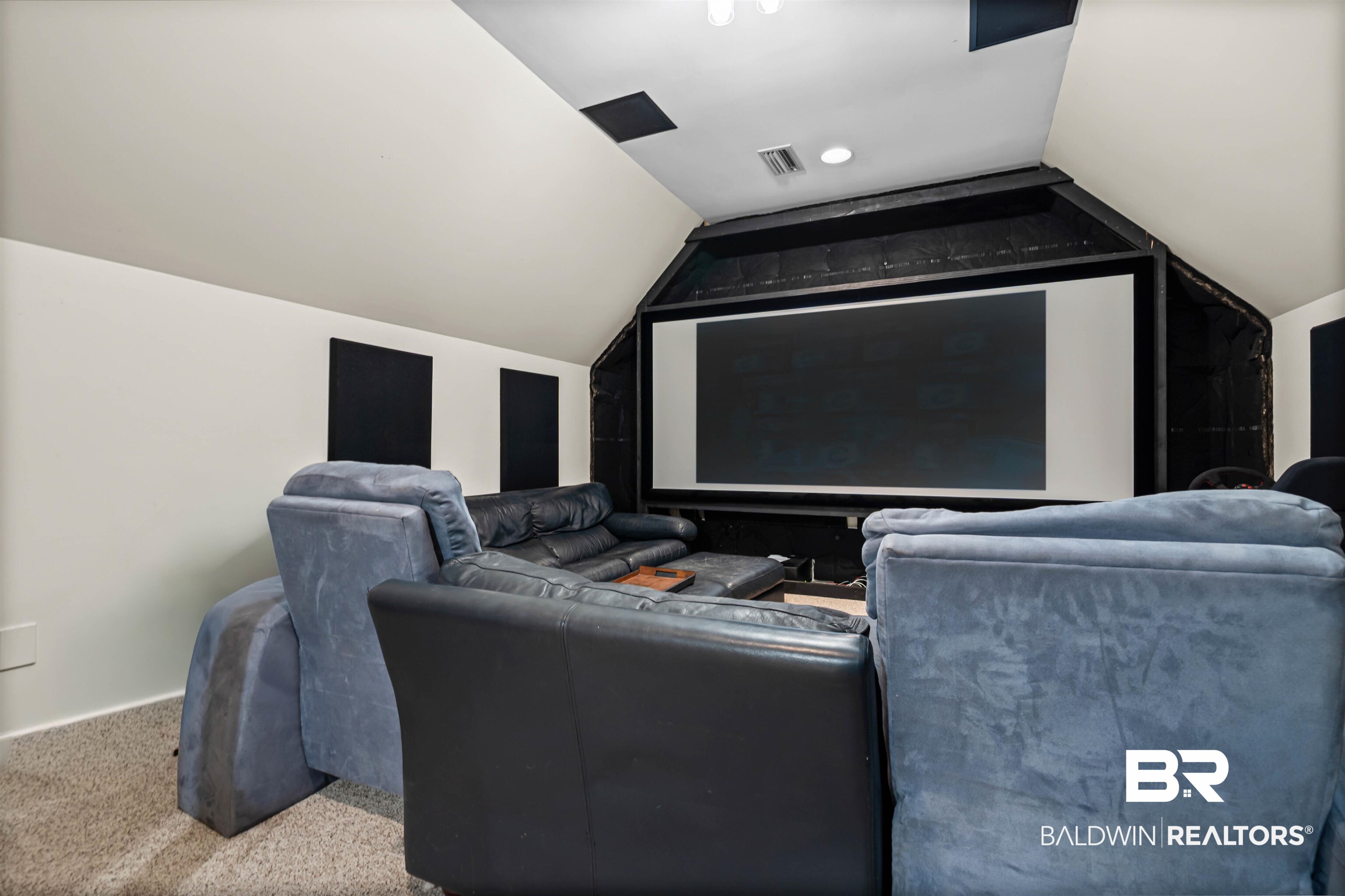 107 Beaver Dam Road Fairhope, AL 36532 - Photo 8 of 45 Carpeted cinema room featuring vaulted ceiling
