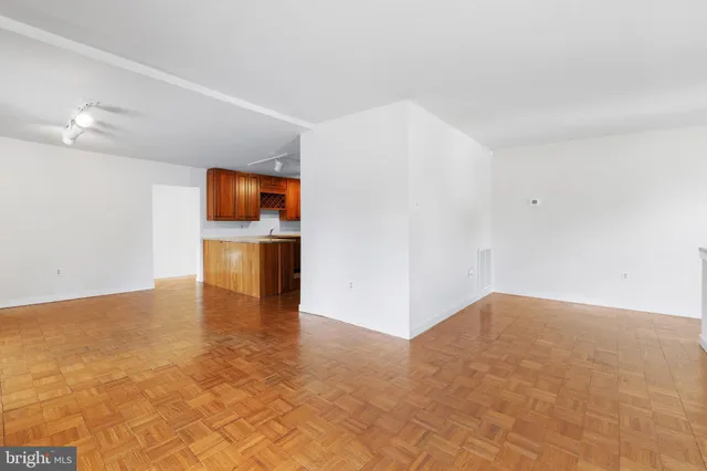 a view of a kitchen with a sink and a microwave