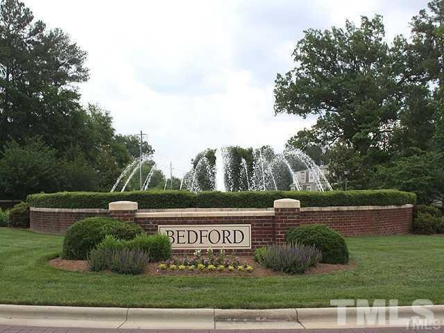 11417 Shadow Elms Lane Raleigh, NC 27614 - Photo 2 of 19 a view of street and sign board