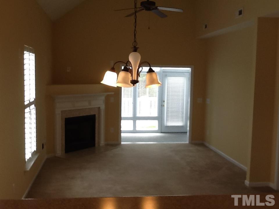 11417 Shadow Elms Lane Raleigh, NC 27614 - Photo 5 of 19 a view of a livingroom with a fireplace