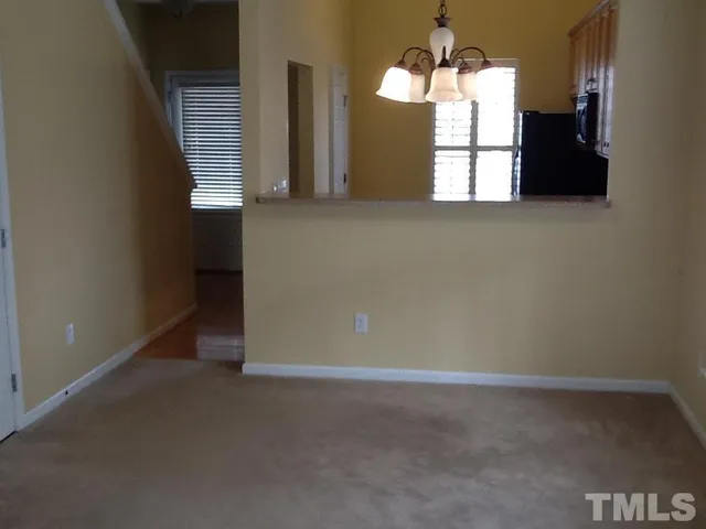 a view of a kitchen with a sink