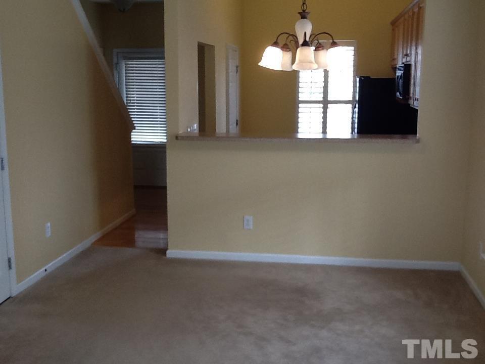 11417 Shadow Elms Lane Raleigh, NC 27614 - Photo 6 of 19 a view of a kitchen with a sink