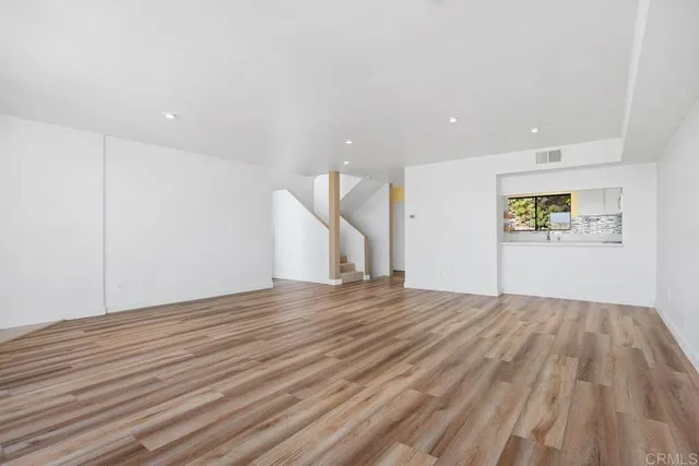 a view of a balcony with chairs