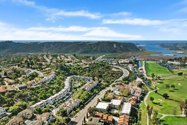 a view of a city with ocean