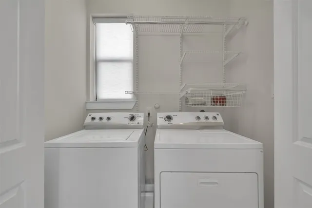 a utility room with dryer and washer