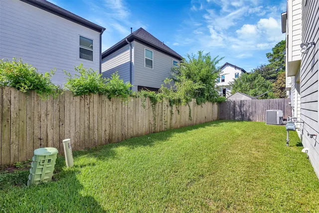 a view of a backyard with a garden