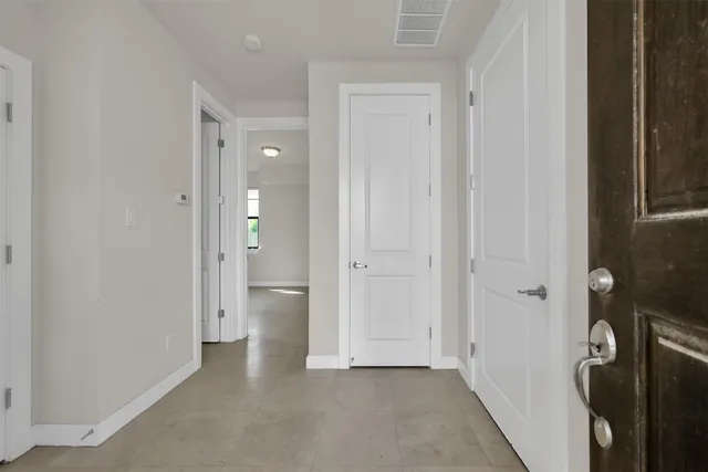 a view of a livingroom with a storage & utility room