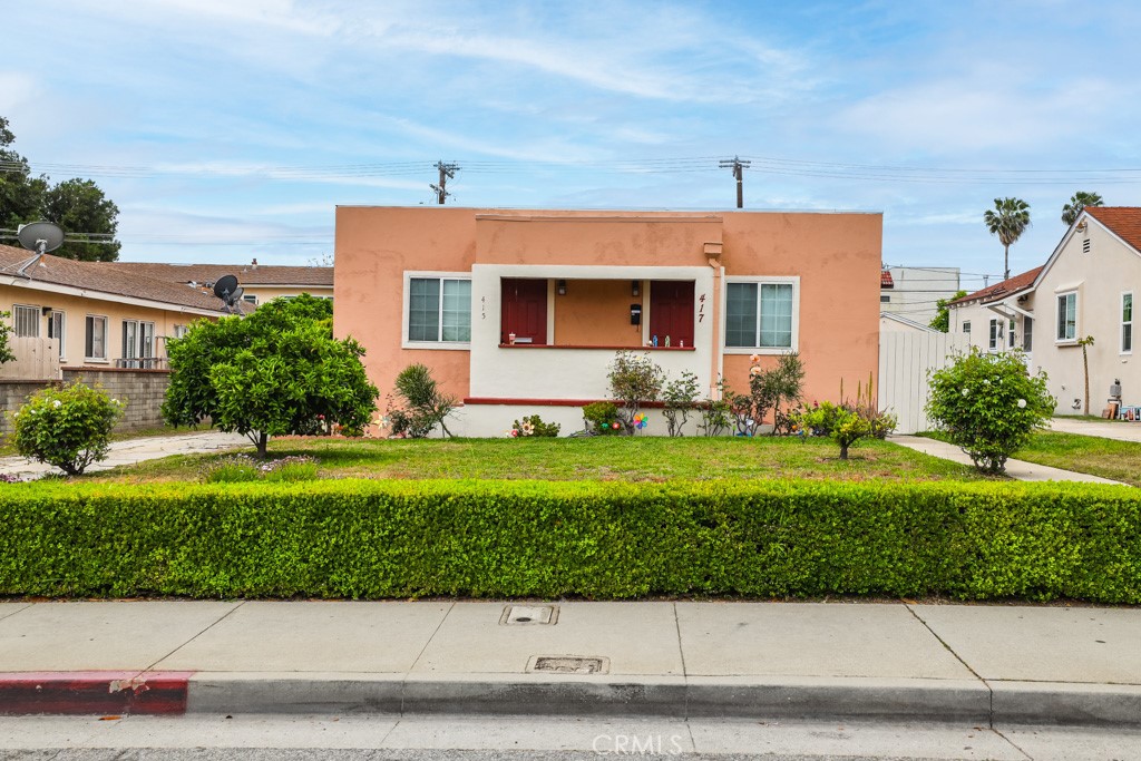 415 North Garfield Avenue Alhambra, CA 91801 - Photo 1 of 1 a front view of a house with a yard